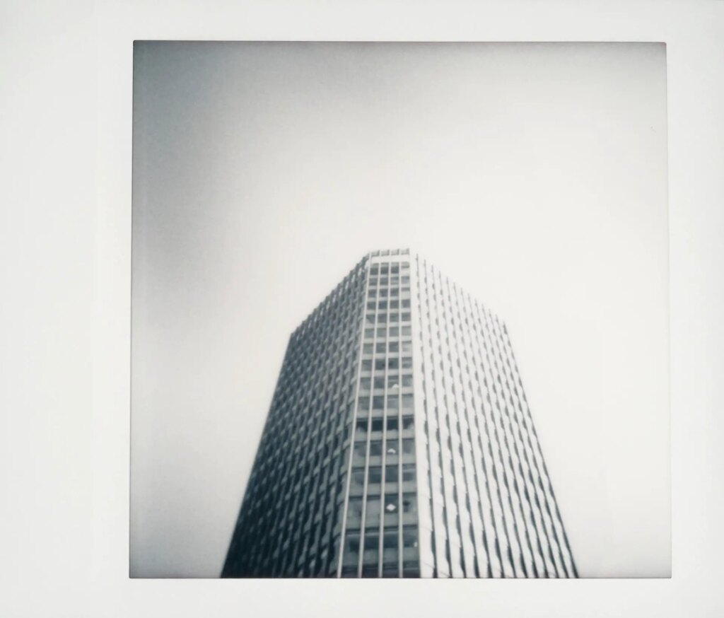 city tower on black and white instax square film