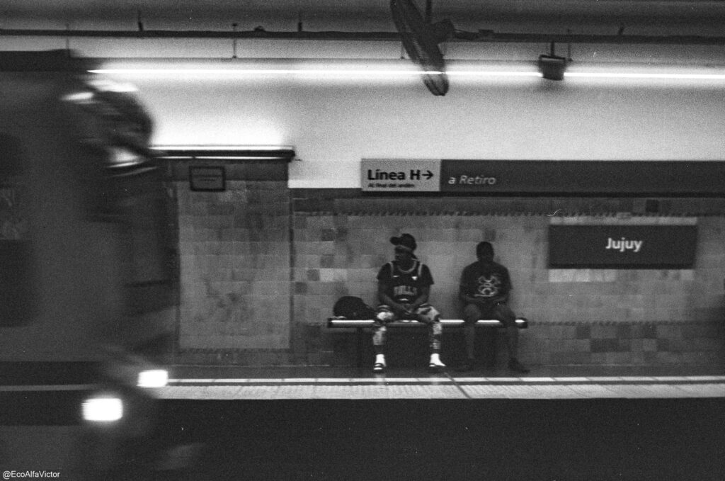Subway arriving at station.