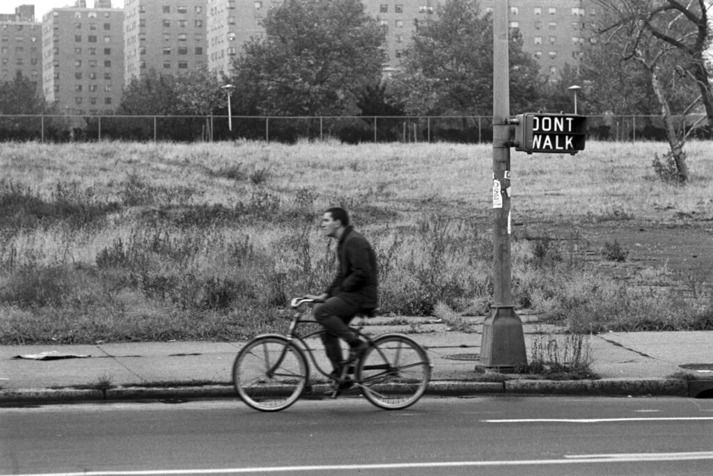 Bicyclist in Newark NJ ca. 1972. Don't Walk pedestrian signal. 