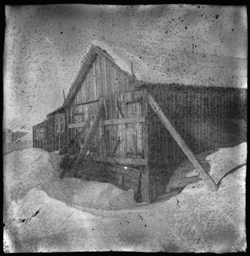 Boat house by the shores - the inverted negative.