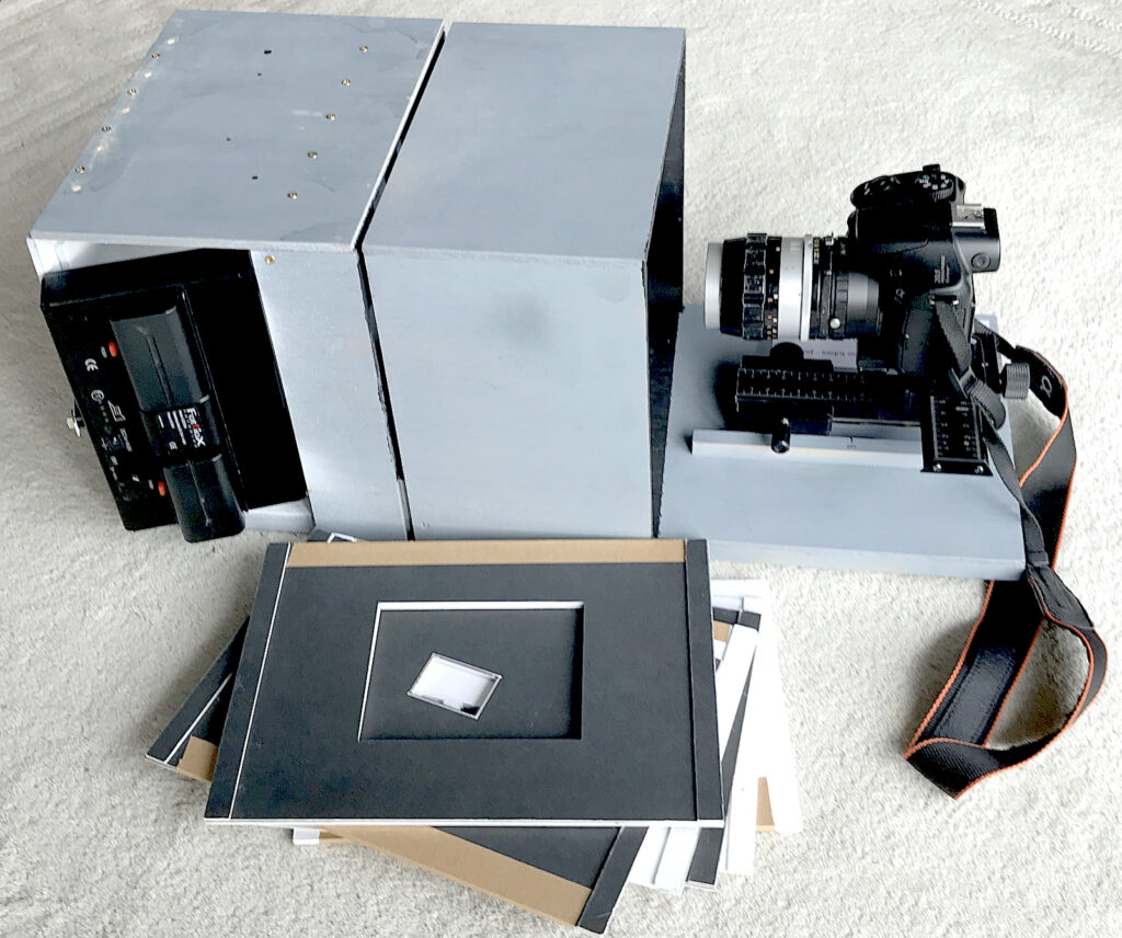 Multi-format copier using dSLR, Micro Nikkor and tubes with negative holders.