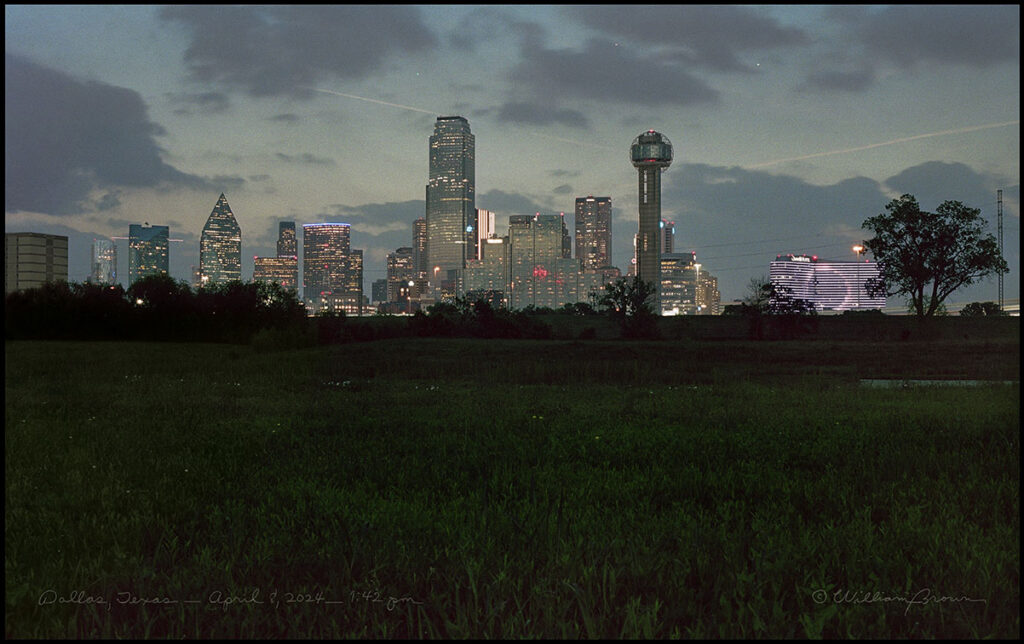 Dallas, Texas skyline at 1:42 p.m. on April 8, 2024 during total solar eclipse