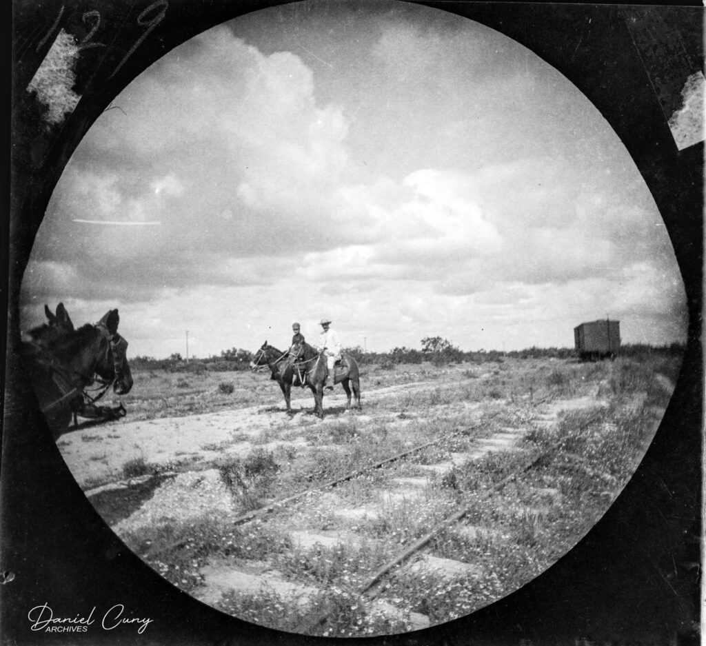 Men on horseback.