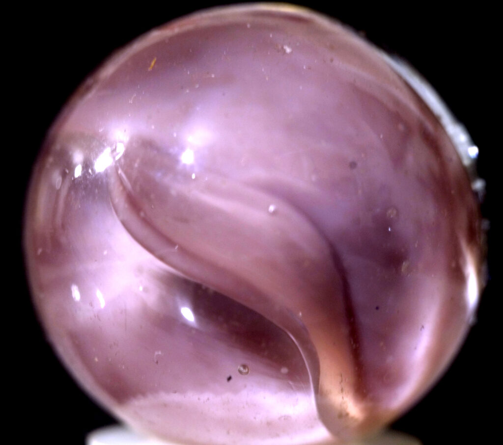 An unusual dusty-lavender four-vein "Cat's-Eye" marble