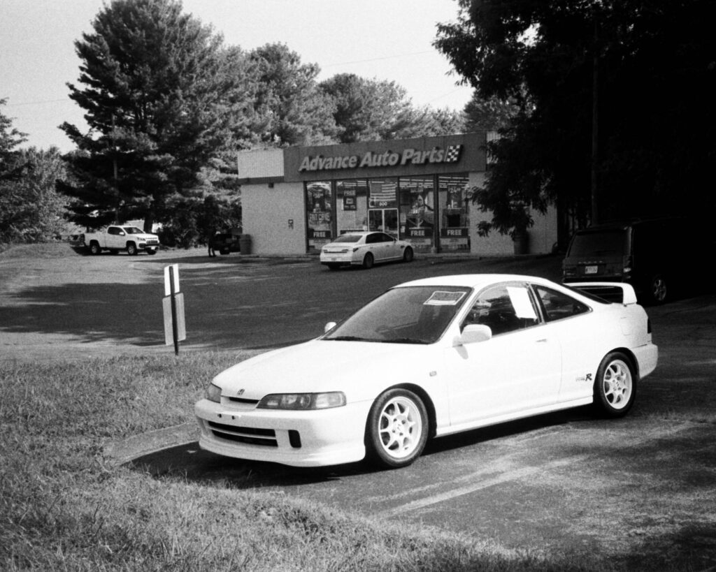 Photo of imported Honda Integra near car parts store