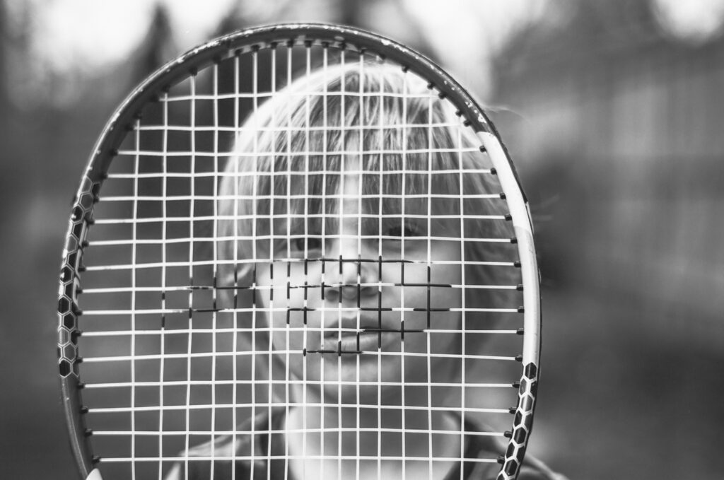 Boy holding tennis Racket