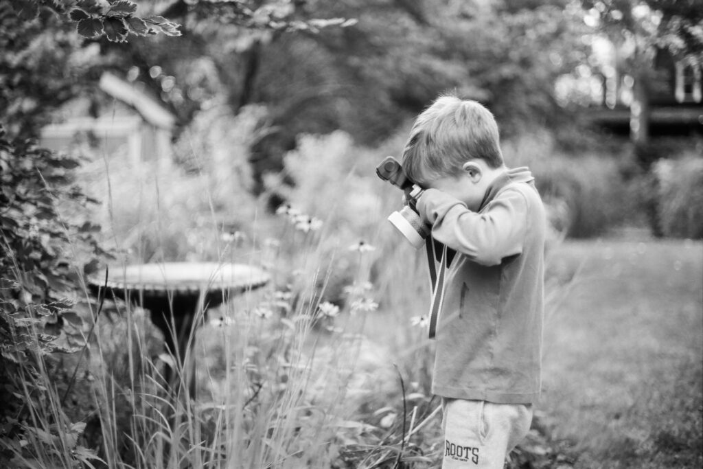 Boy with toy camera