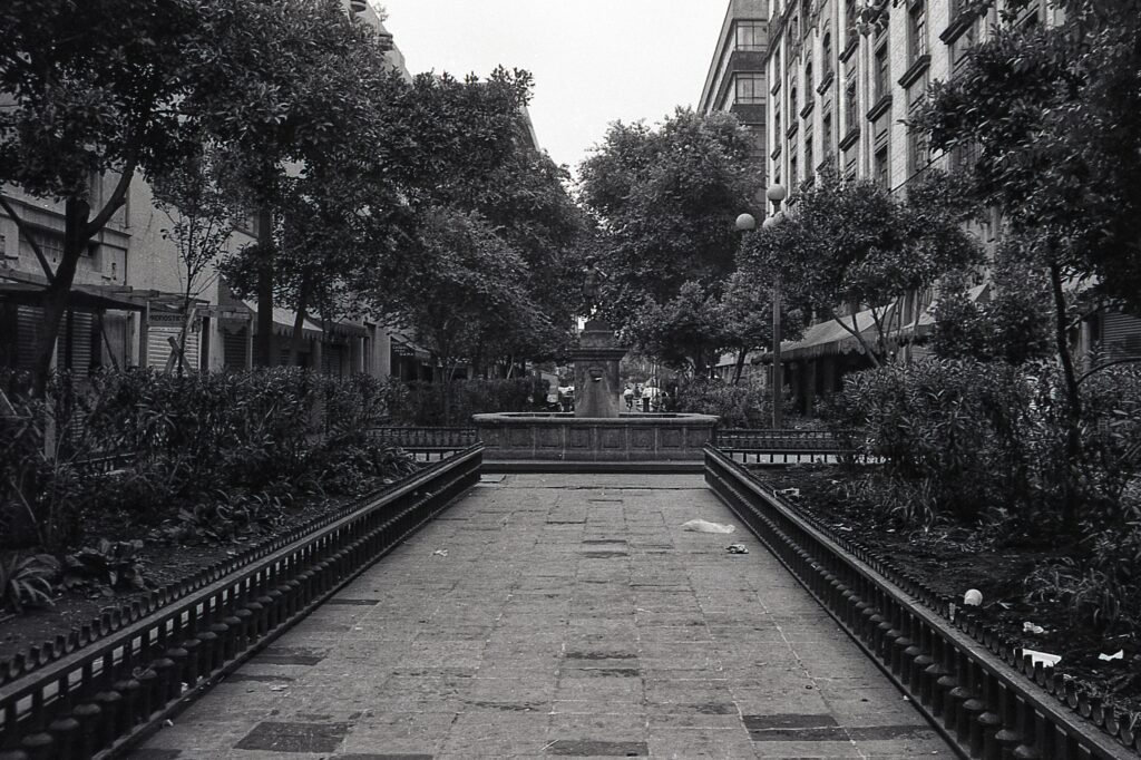 de Palma Street in the Historic Center of Mexico City, 1991. Currently this fountain and the gardens no longer exist, it is now a street for vehicular traffic...