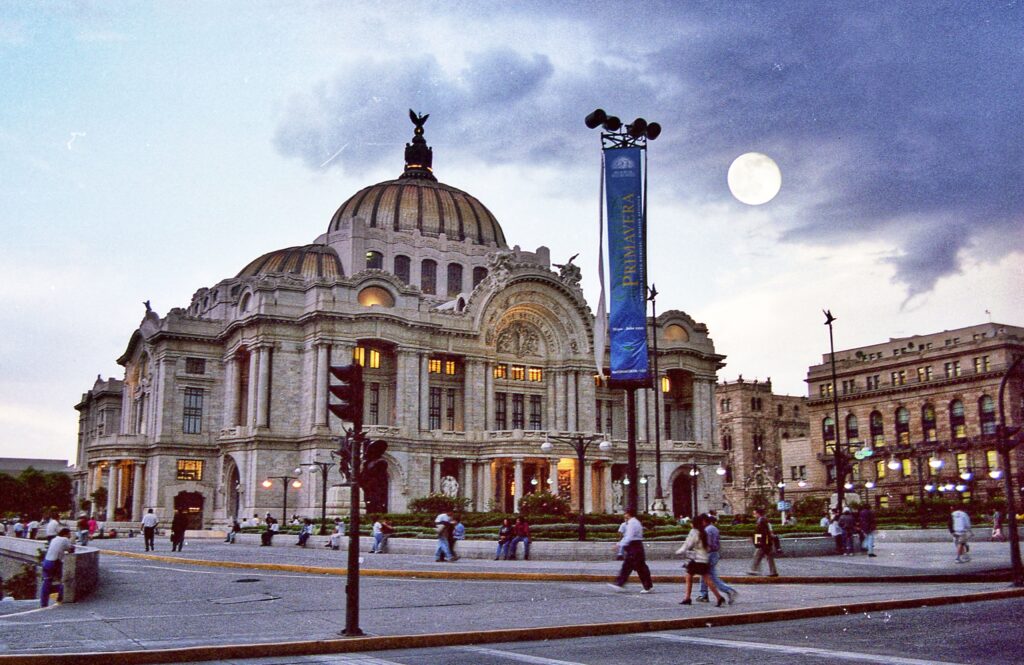 The Palace of Fine Arts, in the Center of Mexico City. (I did a double exposure to include the full moon)