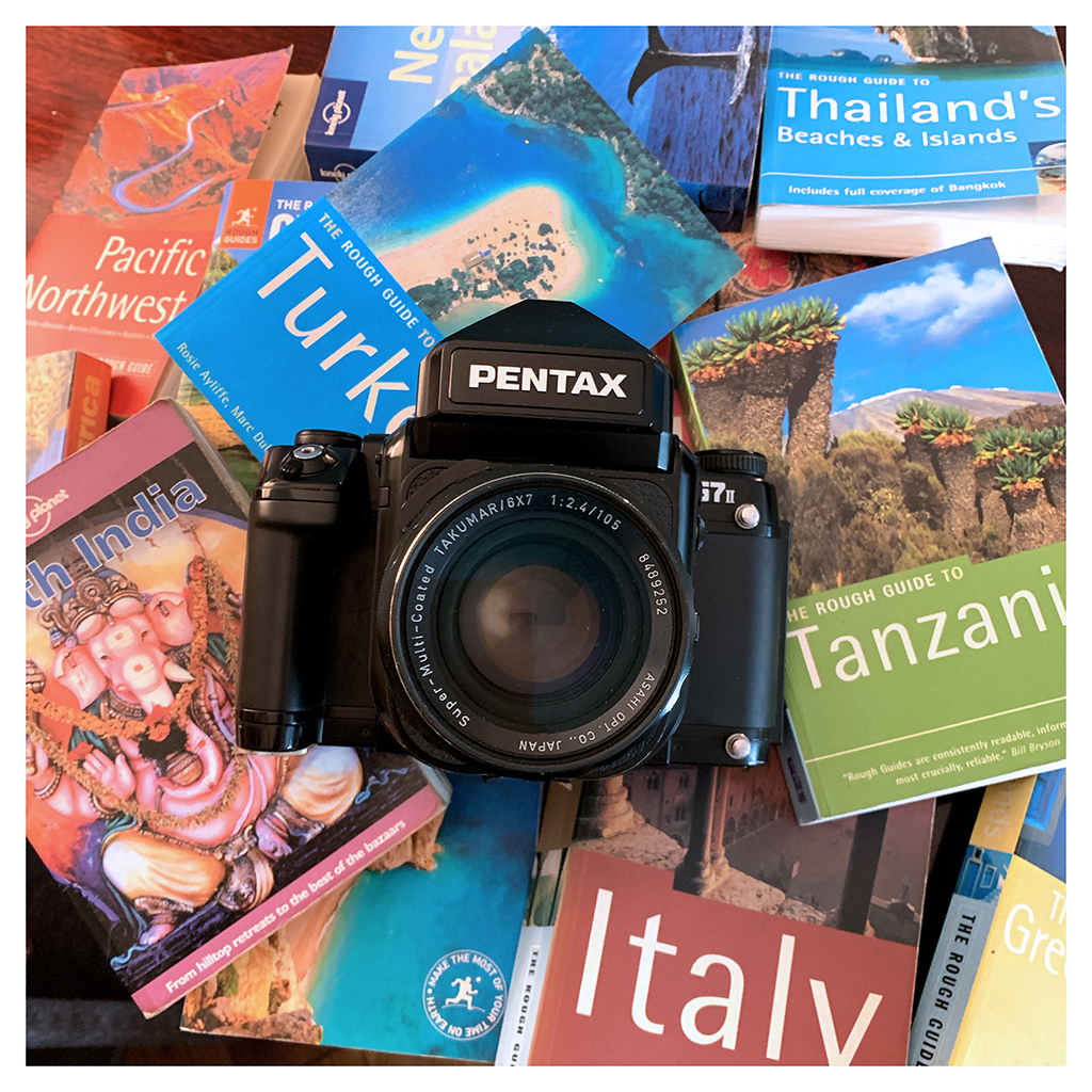 Pentax 67II surrounded by guidebooks