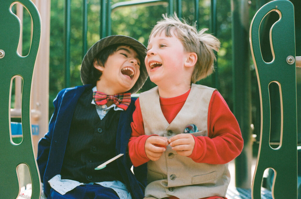 Two boys laughing