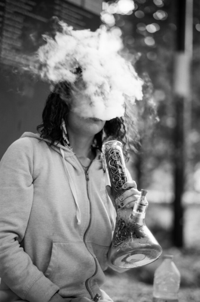 Woman smoking bong