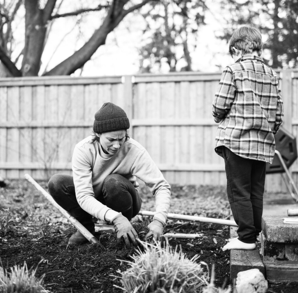 Woman and boy in garden