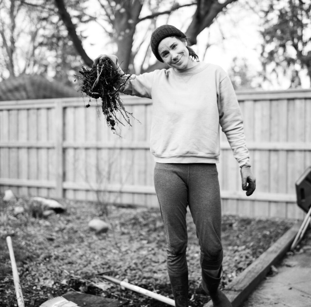 Woman holding root