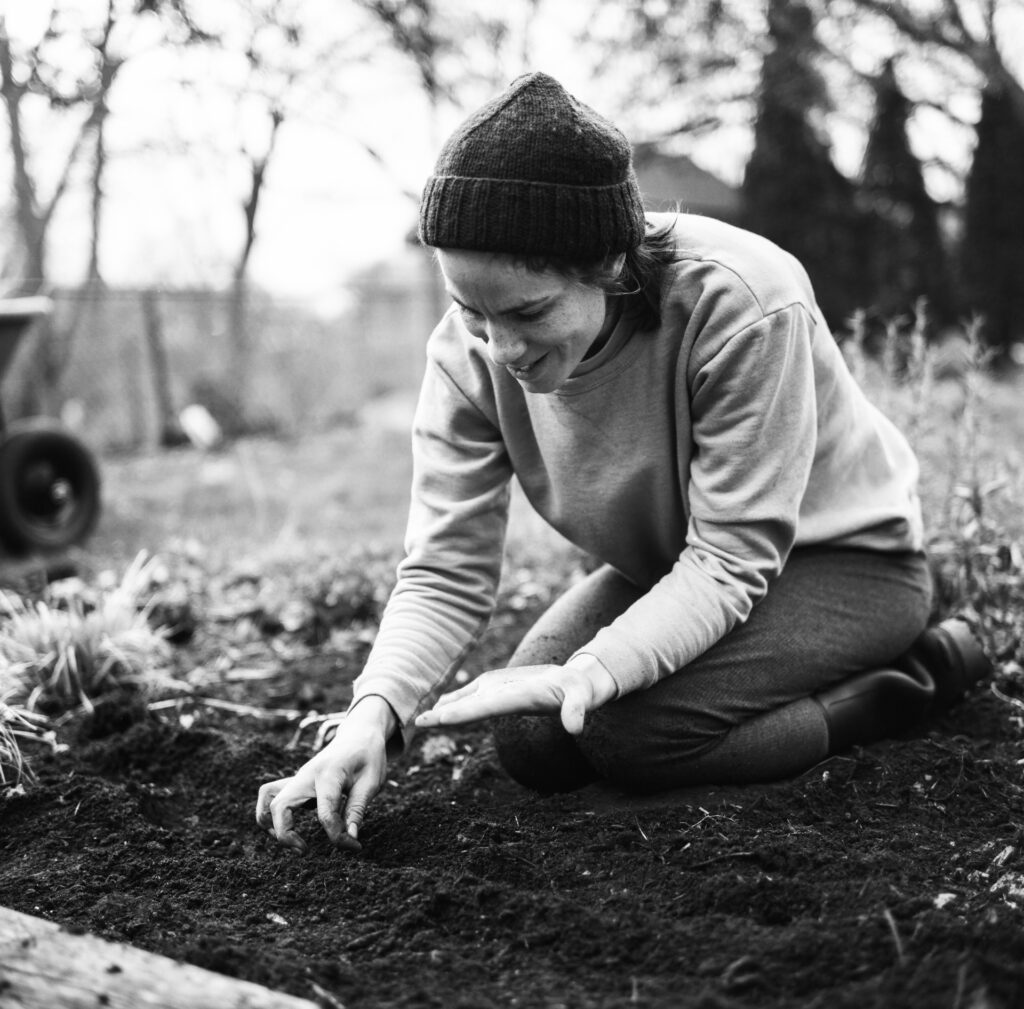 Woman planting seeds