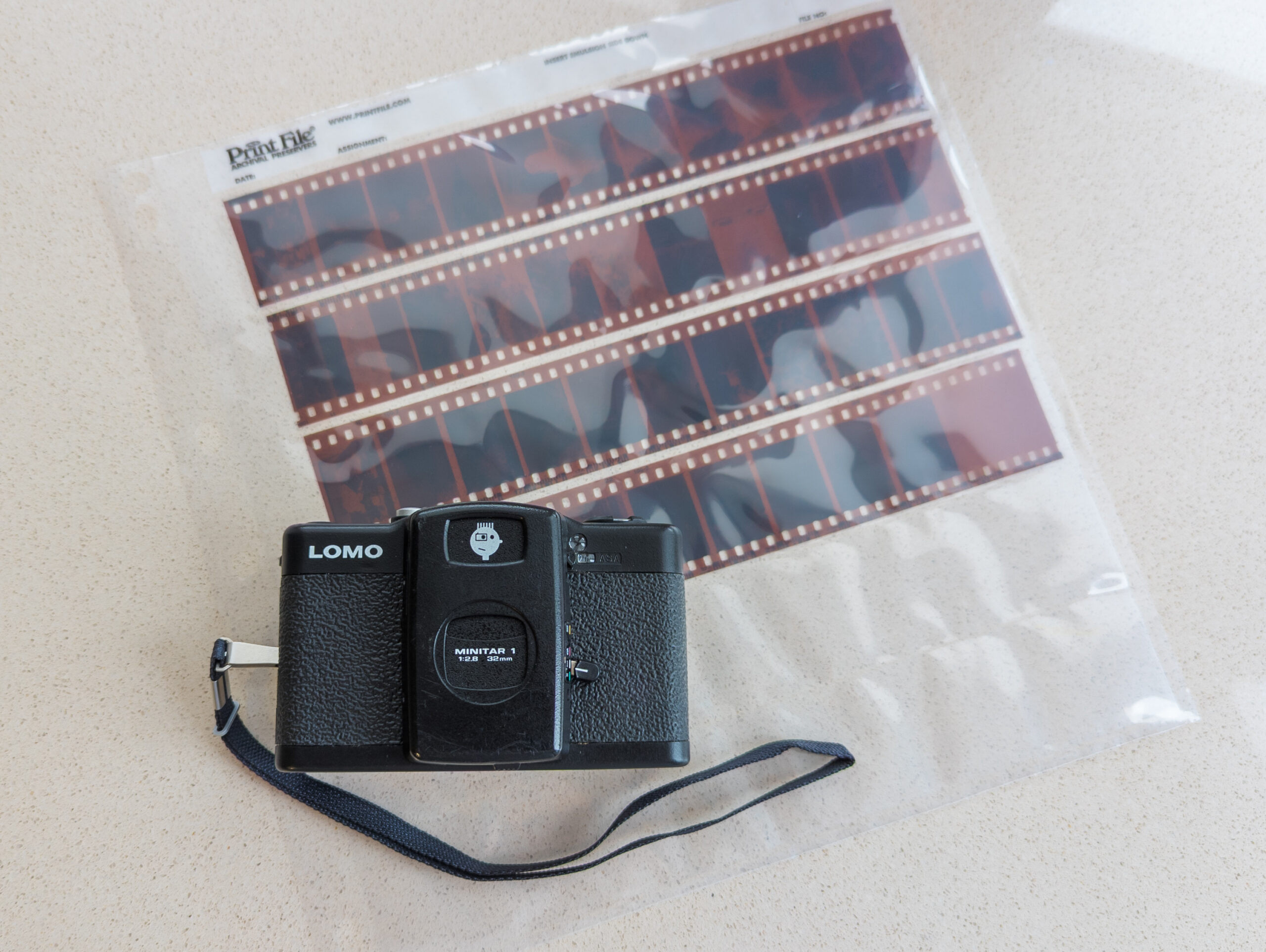 Fetured image for article "How I modded Lomo LC-A+ into half-frame camera"