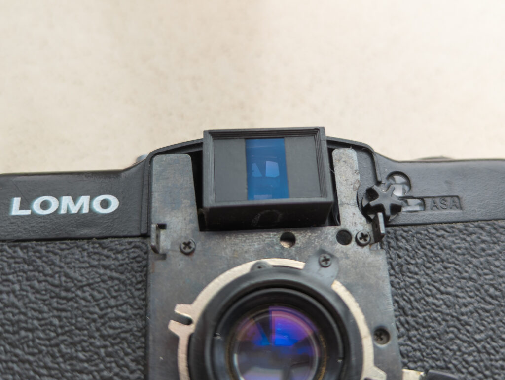 Both masking stickers are in place on Lomo LC-A+ viewfinder