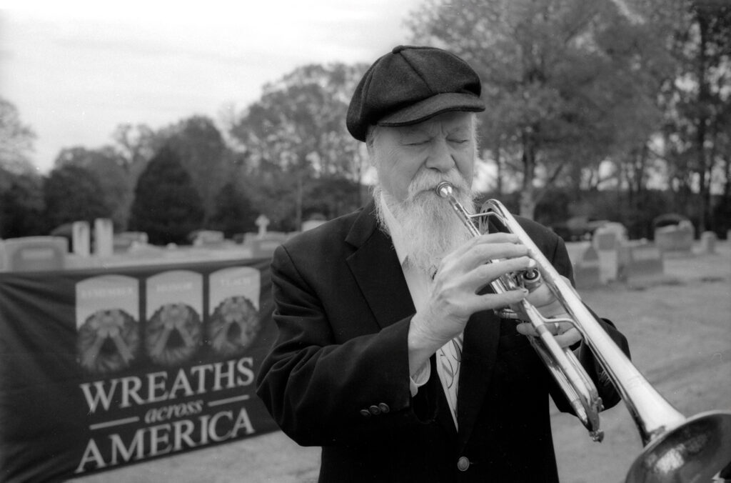 Chuck playing taps 