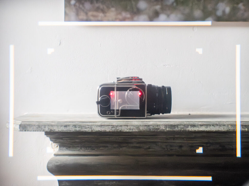 The view through a Leica M4-P's viewfinder, with laser spot, and it's rangefinder ghost.