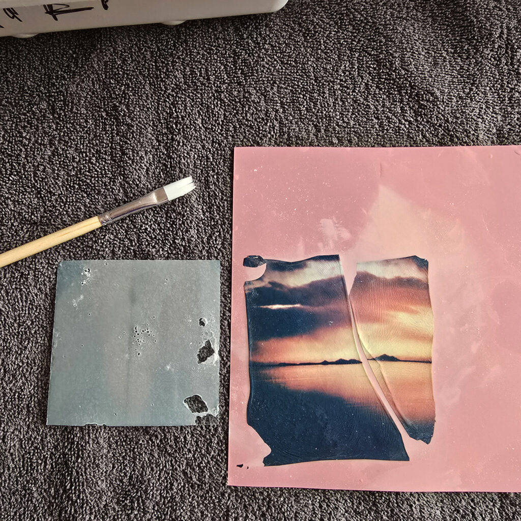 polaroid emulsion, polaroid lift, pink paper, paintbrush